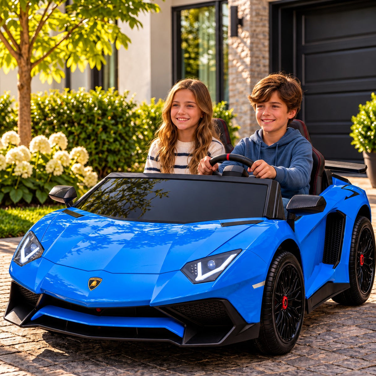 Blue Lamborghini Aventador XXL 24V Two Seat Ride-On Car for Big Kids Lifestyle, Boy and Girl Driving in Front of the Garage