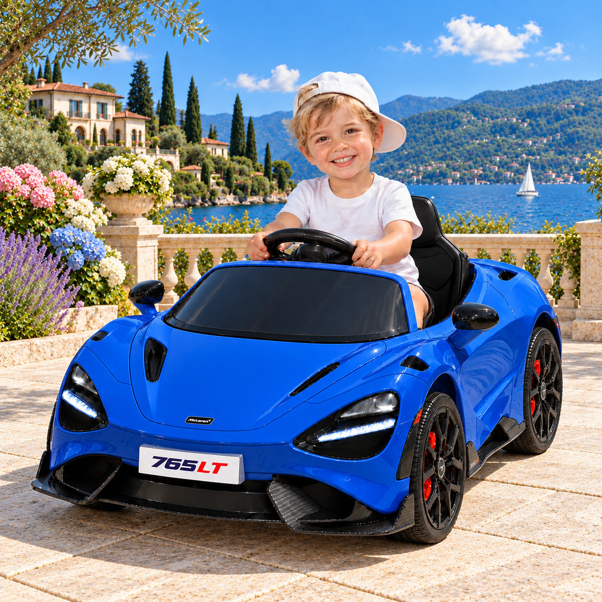 Blue McLaren 765LT 12V Kids Ride-On Car with Parental Remote, Boy Driving on a Lakeside Villa Terrace