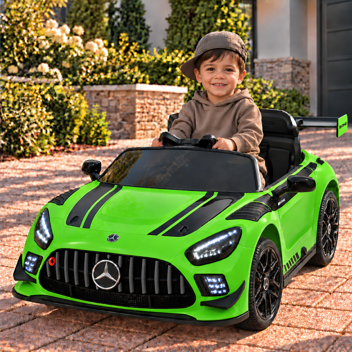 Green Mercedes AMG GT3 EVO 12V Kids Ride-On Car with Parental Remote, Boy Driving on a Driveway
