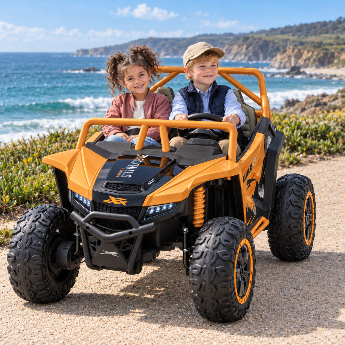 Honey Gold Arctic Cat XL 24V 4WD Two Seat Kids UTV Side by Side, Lifestyle Photo of Two Kids Riding by the Ocean
