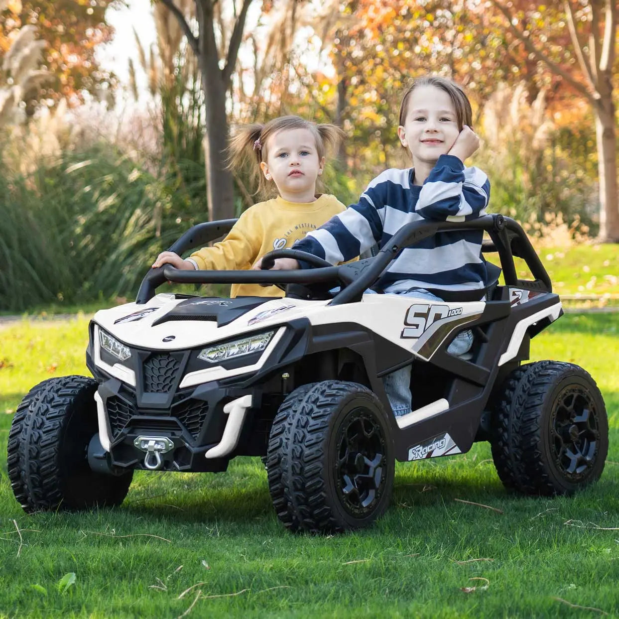 White Trail Runner 24V 4WD kids electric ride-on UTV, front view with LED headlights and dual seats