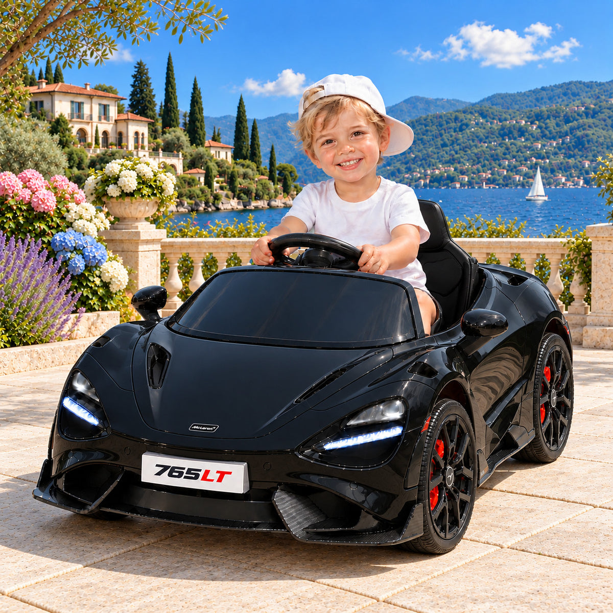 Black McLaren 765LT 12V Kids Ride-On Car with Parental Remote, Boy Driving on a Lakeside Villa Terrace
