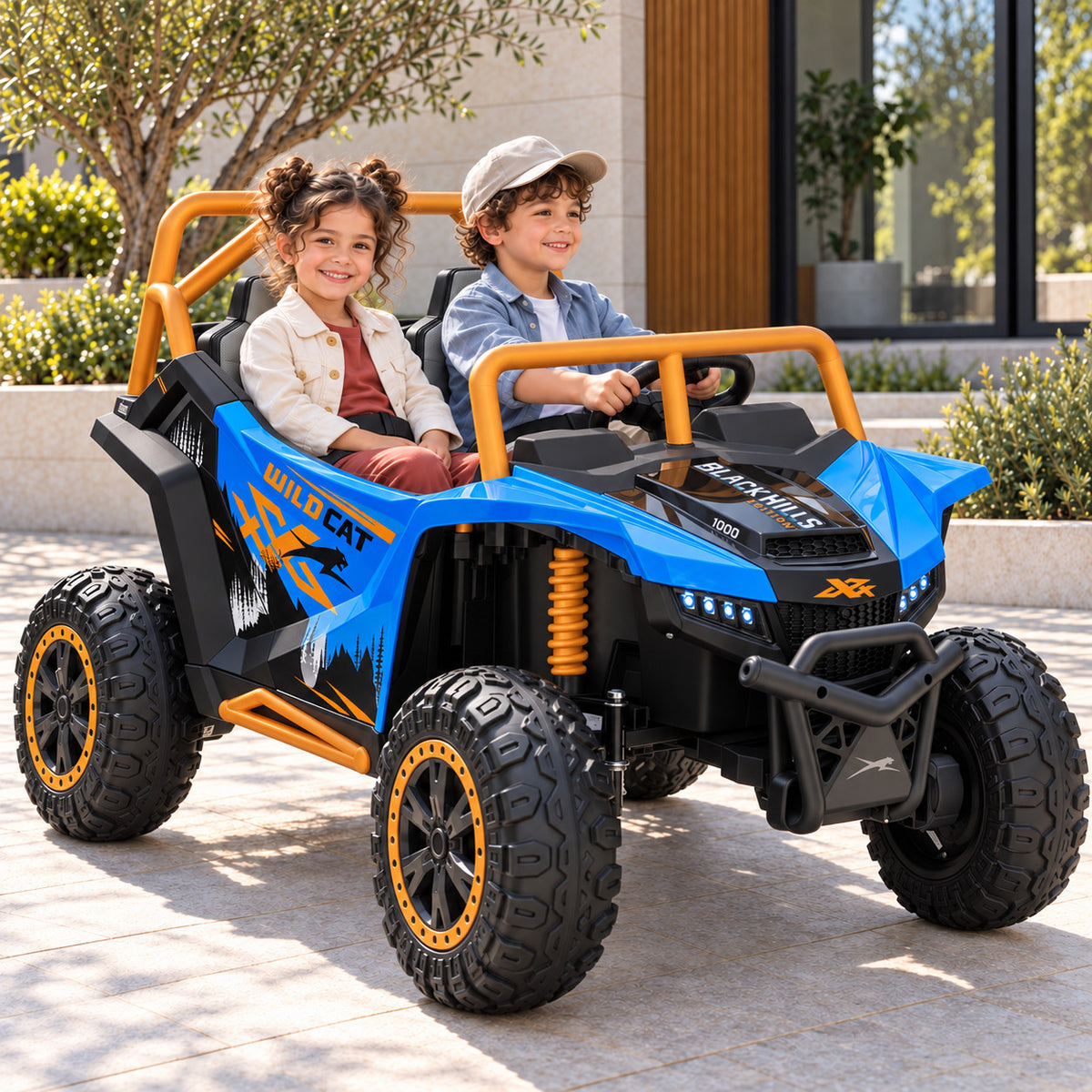 Blue Arctic Cat XL 24V 4WD Kids Ride-On UTV, Two Seater Lifestyle Photo of Two Kids Driving on a Driveway