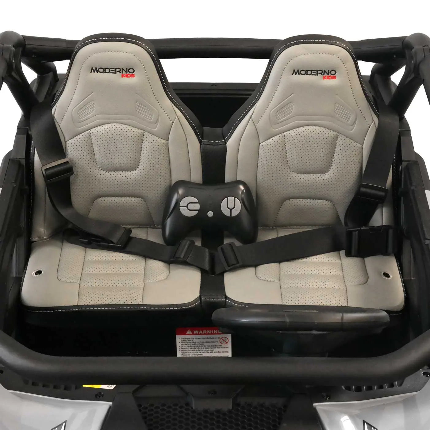 Blue Trail Runner 24V 4WD kids electric ride-on UTV, interior view with LED headlights and dual seats and parental remote