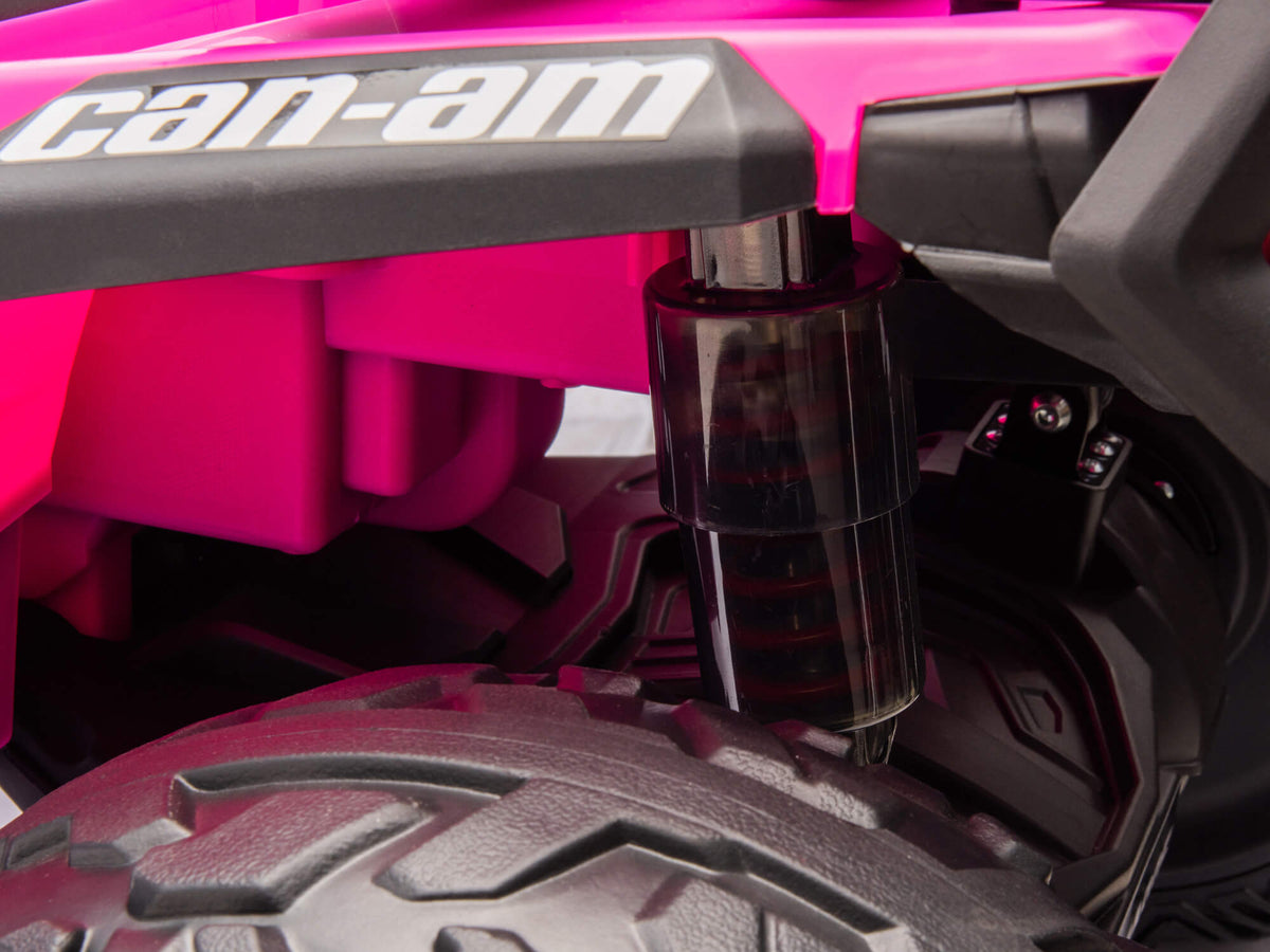 Rear Shock Absorber on the Deep Pink Can-Am Outlander 24V Kids ATV
