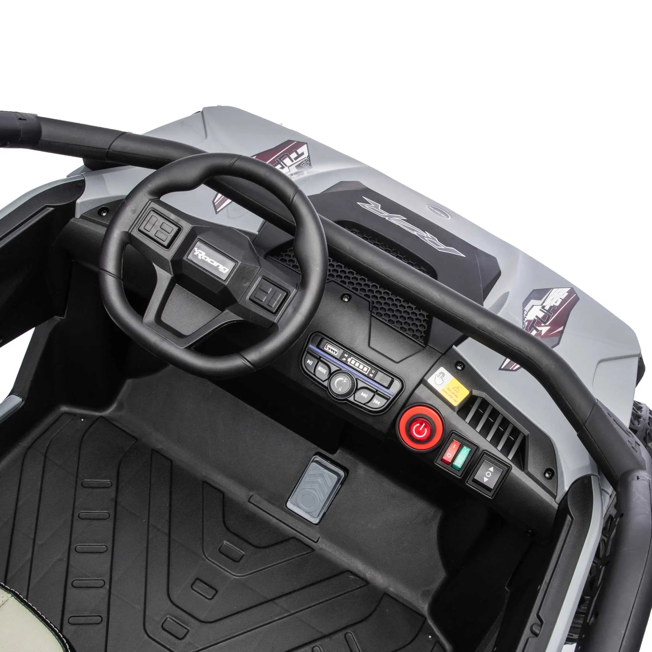 Gray Trail Runner 24V 4WD kids electric ride-on UTV, interior legroom view with LED headlights, dashboard and dual seats