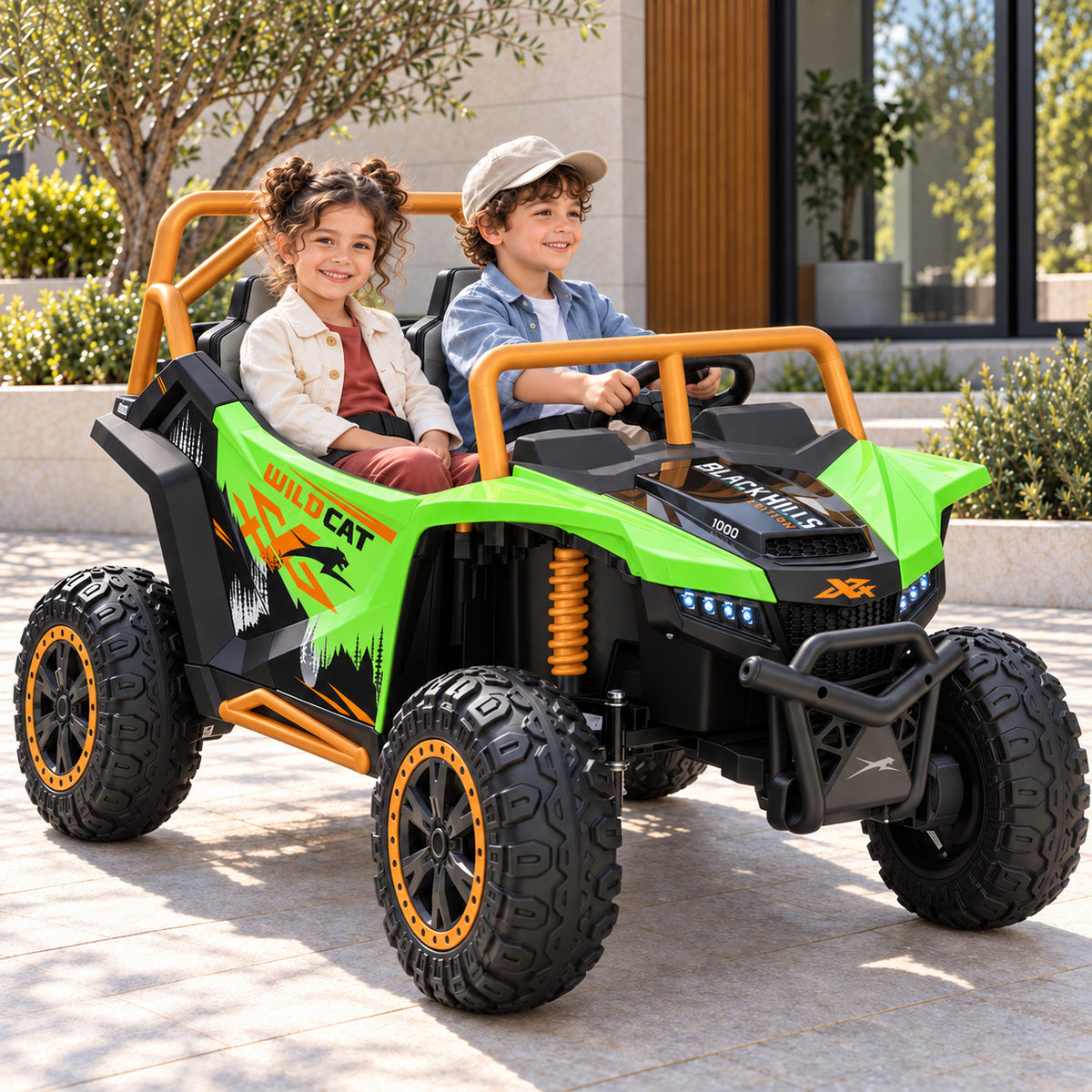 Green Arctic Cat XL 24V 4WD Kids Ride-On UTV, Two Seater Lifestyle Photo of Two Kids Driving on a Driveway