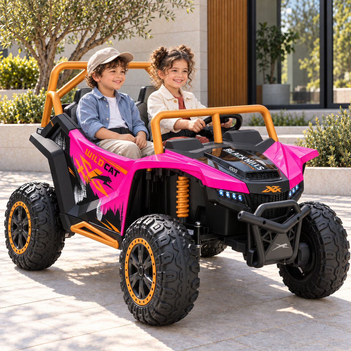 Pink Arctic Cat XL 24V 4WD Kids Ride-On UTV, Two Seater Lifestyle Photo of Two Kids Driving on a Driveway