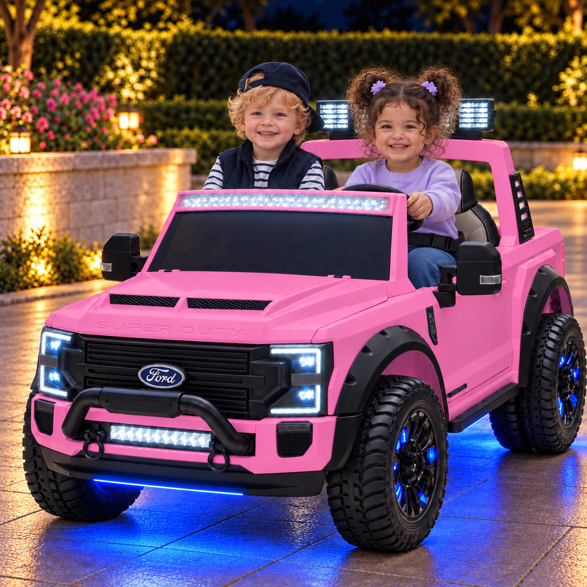 Pink Ford F450 24V Kids Ride-On Truck with LED Light Bars and Blue Underbody Lights, Night Lifestyle Photo