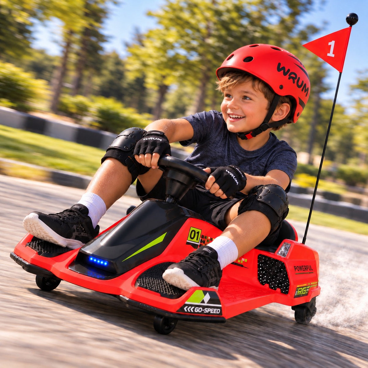 Red 360° Drift Glider 24V Electric Drift Kart for Kids – Young Boy in a Helmet Drifting the Kids Go Kart on a Paved Park Track